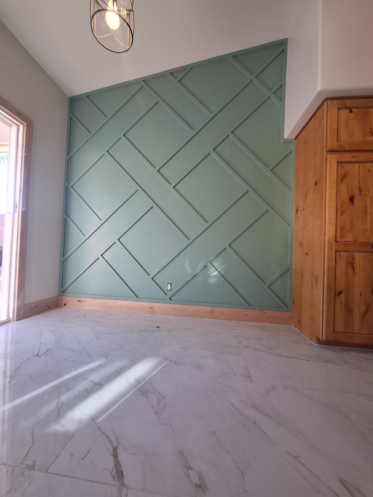 Green geometric accent wall